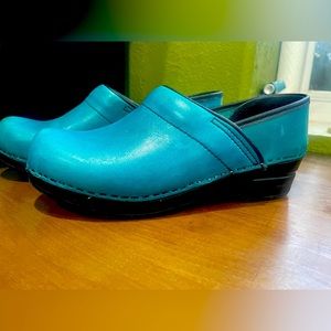 Teal Dansko clogs. Barely worn